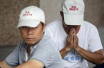Anger and disbelief from MH370 China relatives over debris - 2