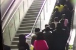 Crowded escalator in China shopping mall abruptly changes direction - 0
