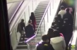 Crowded escalator in China shopping mall abruptly changes direction - 2