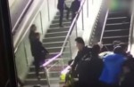 Crowded escalator in China shopping mall abruptly changes direction - 12
