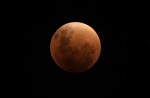 Rare 'supermoon' eclipse unfolds on Sunday night - 25