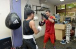 Coach trains boxer for free in Singapore - 1