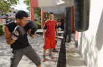 Coach trains boxer for free in Singapore - 4