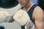 Coach trains boxer for free in Singapore - 5