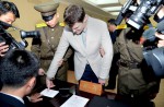 US student sentenced to 15 years hard labour for stealing propaganda banner in N Korea - 7