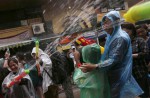 Water-splashing fun at Songkran new year celebrations - 11