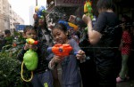 Water-splashing fun at Songkran new year celebrations - 16