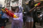 Water-splashing fun at Songkran new year celebrations - 14