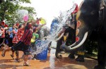 Water-splashing fun at Songkran new year celebrations - 17