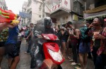 Water-splashing fun at Songkran new year celebrations - 23