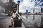 Woman breastfeeds baby at Raffles Place - 4