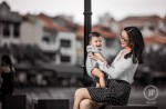 Woman breastfeeds baby at Raffles Place - 3