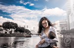 Woman breastfeeds baby at Raffles Place - 5