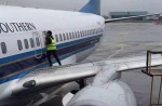 Chinese passenger opens plane's emergency door before takeoff in China - 2