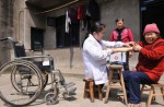 Village doctor without legs makes house calls on wooden benches - 8