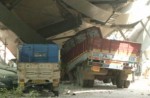 Flyover collapses in Indian city, trapping many - 20