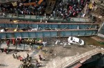 Flyover collapses in Indian city, trapping many - 24