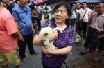 Chinese pole dancers pose as stray dogs to protest dog meat festival - 78