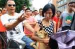 Chinese pole dancers pose as stray dogs to protest dog meat festival - 81