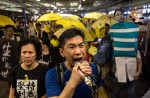 Protesters gather in Hong Kong a year since mass rallies - 7