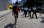 Protesters gather in Hong Kong a year since mass rallies - 11