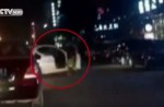 Child flung out of car in China as driver makes sharp turn - 4