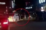 Child flung out of car in China as driver makes sharp turn - 5