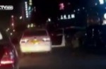 Child flung out of car in China as driver makes sharp turn - 8