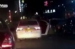 Child flung out of car in China as driver makes sharp turn - 9