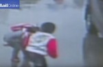 Driver runs over 2 children in China - 9