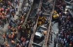 Flyover collapses in Indian city, trapping many - 2