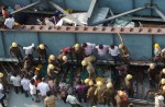 Flyover collapses in Indian city, trapping many - 4