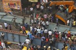 Flyover collapses in Indian city, trapping many - 10