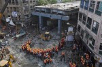 Flyover collapses in Indian city, trapping many - 11