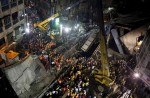 Flyover collapses in Indian city, trapping many - 15