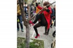 Chinese tourists kick and climb cherry blossom trees to snap photos  - 1