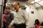 Caught on camera: Old man hurls racist rant on train and assaults passenger - 1