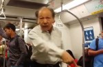 Caught on camera: Old man hurls racist rant on train and assaults passenger - 2