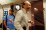 Caught on camera: Old man hurls racist rant on train and assaults passenger - 8