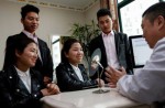 Chinese brothers who married twin sisters undergo surgery to tell them apart - 6