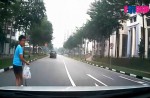 Boy riding scooter recklessly nearly hit by car in Sengkang - 6