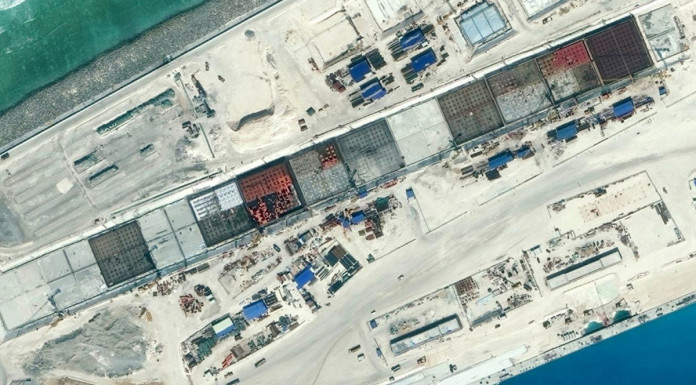 China opens new lighthouse on contested South China Sea reef