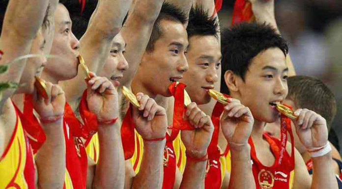 China warns again on sports corruption, lust for gold