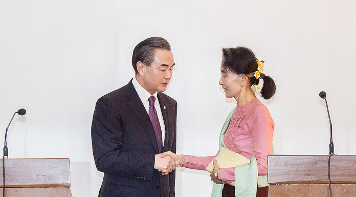 Myanmar's Suu Kyi meets China counterpart in debut as Foreign Minister