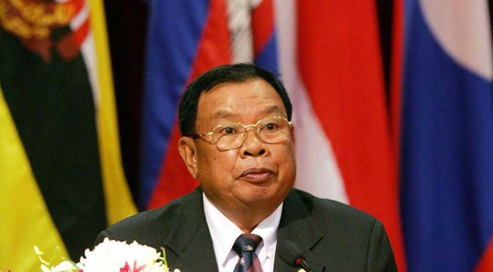 New Laos leaders take office as communists welcome world