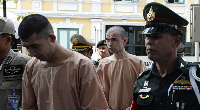 Thai police say 15 bomb suspects at large as two appear in court