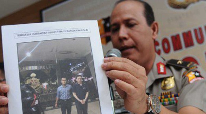 Tycoon arrested for suspected fraud in Indonesia after being deported from Singapore