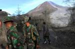 Ash-covered dog seen in aftermath on Mount Sinabung volcano eruption - 5