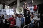 7 Hong Kong police officers charged for attacking protester - 2