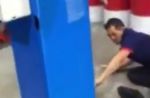 Woman uses umbrella to stop group of men from fighting at Jurong car workshop - 10